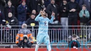 Liverpool drop points as Burnley battle to draw at Anfield