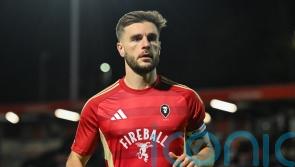 Luke Garbutt helps Salford set up Manchester City clash by beating Swindon