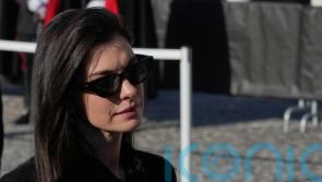 Anne Hathaway and Liz Hurley among celebrities at Valentino funeral in Rome