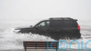 Schools shut and thousands without power as Storm Chandra hits island of Ireland