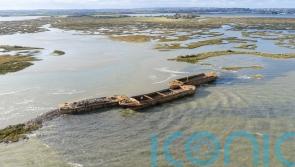 National Trust sinks three barges to form new island for birds