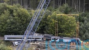 Train driver told to go at normal speed just minutes before derailment &ndash; inquiry