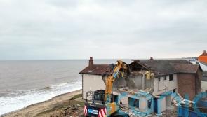 Demolition of six more homes begins in erosion-hit seaside village
