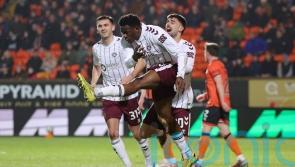 Hearts surge seven points clear after brushing aside nine-man Dundee United