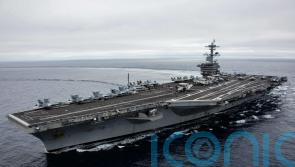 US shoots down Iranian drone that approached aircraft carrier, military says
