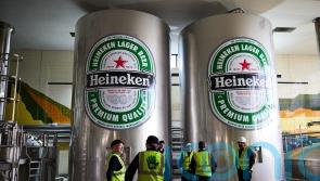 Beer giant Heineken to axe up to 6,000 jobs