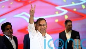 New prime minister vows to work for democracy after landslide victory