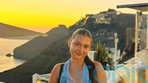 Woman killed when car collided with bus near Belfast named