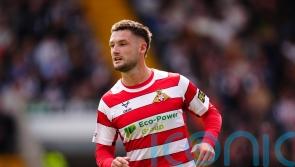 Luke Molyneux on the spot as Doncaster edge out Huddersfield