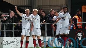 Cheltenham beat 10-man Salford after late drama