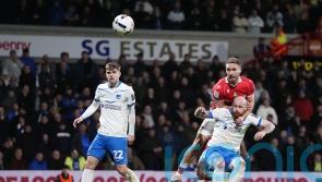 Wrexham maintain promotion push with battling win over Portsmouth