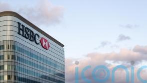 HSBC to meet &pound;1.1bn cost savings target early after cutting back senior roles