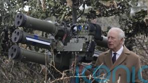 King takes part in air defence exercise and meets military families at barracks