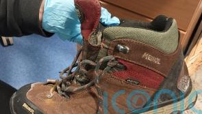 Police release image of footwear in bid to identify woman found dead off Iona