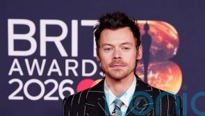 Florals, feathers and colour flashes on glittering Brits red carpet