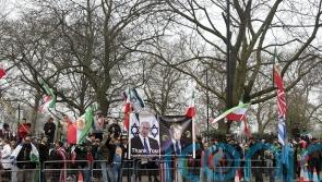 Demonstrators gather outside Iranian embassy in support of war