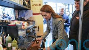Kate makes cappuccino for William during Borough Market visit