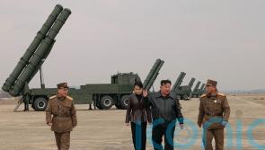 North Korean leader Kim observes test of rocket launch systems with daughter
