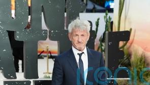 Sean Penn bags third Oscar but skips ceremony
