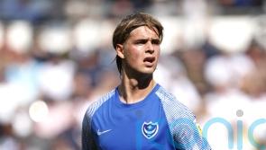 Ryley Towler snatches leaders Lincoln a point at Huddersfield