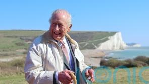 King opens longest managed coastal walking route in the world