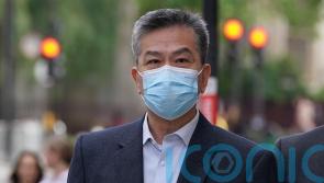 Retired police officer denies working as spy for Hong Kong government in UK