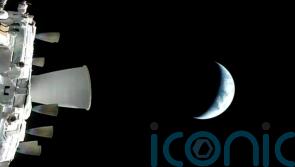 Manned mission to Moon fires engines to leave Earth&rsquo;s orbit