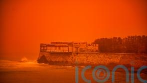 Saharan dust storm turns sky red over holiday island of Crete