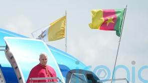 Pope arrives in Cameroon as separatists announce three-day pause in fighting