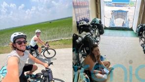 Couple biking 100km a day from Thailand to Australia, inspired by dad&rsquo;s 1980s trip, say &lsquo;we&rsquo;ll do it no matter the cost&rsquo;