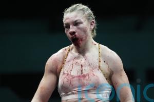 Lauren Price comes through toughest battle yet to retain world titles in Cardiff