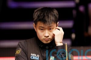 Zhao Xintong kicks off World Championship defence by edging past Liam Highfield