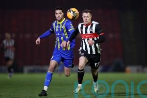 Cameron McJannet grabs stoppage-time winner as Grimsby beat Cambridge