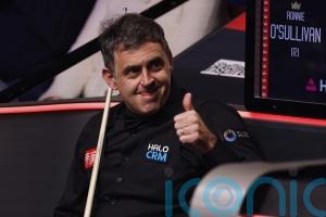 Ronnie O’Sullivan picks up cue from under bed in Ireland and storms into last 16