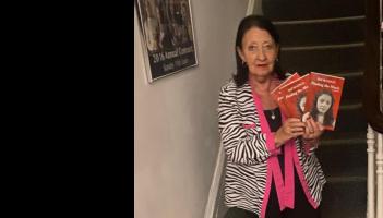 Ray McGinley with her newly published memoir, 'Finding the Music'.