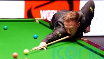 Judd Trump breaks century record in Crucible quarter-final win over Luca Brecel