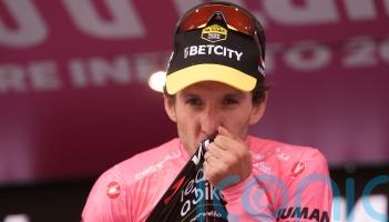 Simon Yates finishes safely in peloton to seal victory at Giro d’Italia