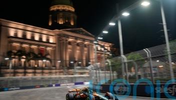 Lando Norris breaks front wing after pit collision during Singapore GP practice