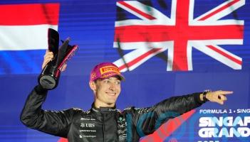 McLaren duo collide on opening lap before George Russell wins Singapore GP