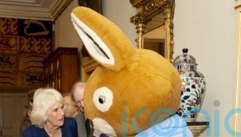 Queen meets Peter Rabbit as she wishes reading charity ‘happy 100th birthday’
