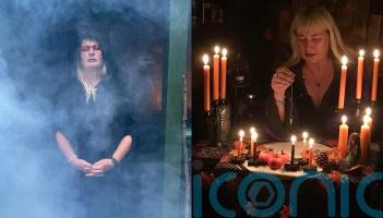 Witch claims to communicate with ancestors at Halloween through a silent meal, using tarot cards and pendulums
