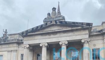 Man in court accused of punching and spitting on police