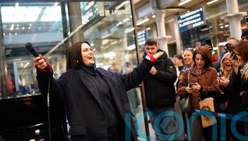 Jessie J surprises passers-by at St Pancras with performance