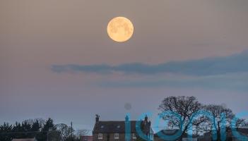 Wolf supermoon appears in clear UK skies