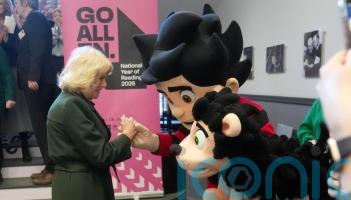 Camilla meets comic book characters during reading initiative launch