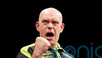 Michael van Gerwen beats debutant Gian van Veen to win Premier League opener