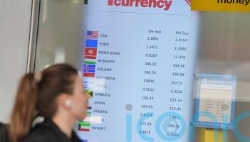 Gold prices rise and dollar dips after Trump declares 15% global tariff