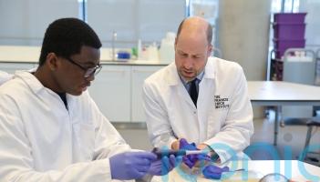 William told he is &lsquo;doing a great job&rsquo; handling mouse sample during lab visit