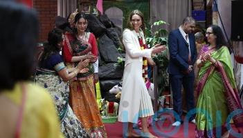 Kate joins Hindu worshippers in dance during visit to temple