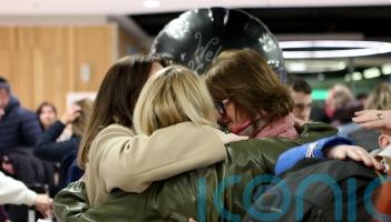 Relieved family reunions at Dublin Airport as chartered flight lands